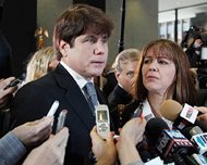 Former Gov. Rod Blagojevich speaks to reporters as his wife, Patti, listens at the federal building in Chicago in this file photo from Dec. 7, 2011. Today, the U.S. Supreme Court declined to hear Blagojevich’s appeal of his corruption conviction, which included his attempt to sell the vacant Senate seat once occupied by President Barack Obama. 