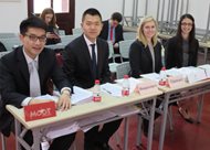 Jennifer Fair (third from left) and Kelsey Leingang wait to face a team from Dalian Maritime University of China during the Moot Shanghai competition the week before the team went to Hong Kong for the Willem C. Vis International Commercial Arbitration Moot.