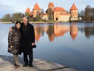 Joel M. Hurwitz, a partner at Arnstein & Lehr LLP, and his wife pose before the Trakai Island Castle in Lithuania in October. Hurwitz taught law through the Center for International Legal Studies Visiting Professorship for Senior Lawyers in Vilnius, Lithuania. He and fellow Arnstein partner Robert E. McKenzie were two of 35 American attorneys to bring common law legal system topics to law students in former republics of the Soviet Union.