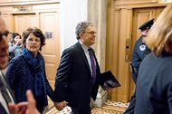 Sen. Al Franken, D-Minn., arrives with his wife Franni Bryson on Capitol Hill this morning. The former “Saturday Night Live” cast member and radio host announced he will step down from office in the wake of several allegations of sexual harassment of women. 