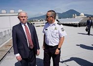 U.S. Attorney General Jeff Sessions with Howard Augusto Cotto Castaneda (center) Director General of El Salvador’s National Police as they look over the city from the roof during a visit to the National Police Headquarters in San Salvador Friday. 