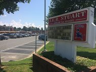 The sign for J.E.B. Stuart High School in Falls Church, Va., named after the slaveholding Confederate general who was mortally wounded in an 1864 battle. With a new school year dawning, education officials around the nation are grappling with whether to remove the names, images and statues of Confederate figures from public schools, some of whom are now filled with students of color who could be descendants of those whom the South fought to keep in slavery. 