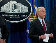 Attorney General Jeff Sessions attends a news conference to announce an international cybercrime enforcement action at the Department of Justice Thursday morning in Washington. 