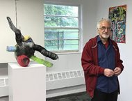 This May 13 photo shows Larry Dell at the opening of an art exhibition he curated in Livingston, N.J. Dell, 68, grew up in New York City with parents he loved. He learned only nine years ago that he had been adopted as an infant, and that he was one of five siblings in his birth family. "It was a shock to learn that, and the bigger shock was when I couldn't find out who my birth parents were," he said. 
