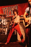 A 20-something Peter J. Strand plays bass in the rock band Yipes from 1977 to 1981. Strand, now a partner at the entertainment law firm Leavens, Strand & Glover LLC, and the four other Yipes members are now recording a third album — 36 years after their previous release. 