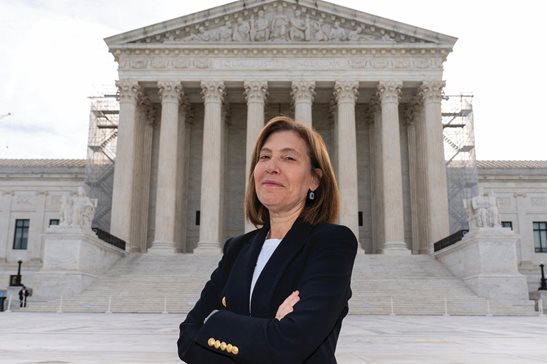 Lisa Blatt of Williams & Connolly LLP poses in front of the Supreme Court last week in Washington. Known for her humor, bluntness and informality, Blatt will argue her 50th case before the Supreme Court later this month, more than any other woman.AP Photo/Alex Brandon