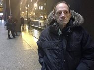 Kim Pindak stands outside Chicago’s federal courthouse Monday after the first day of testimony in a civil lawsuit that he and another panhandler brought that alleges they lost up to $10 a day because authorities barred them from begging in Daley Plaza. The trial was a rare instance of jurors being asked to decide the issue of panhandlers’ rights. 