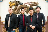 A portrait of Asian-American band The Slants, with members (from left to right) Joe X Jiang, Ken Shima, Tyler Chen and Simon "Young" Tam in Old Town Chinatown, Portland, Ore., on Aug. 21, 2015. The Supreme Court raised doubts Wednesday about a law that bars the government from registering trademarks that are deemed offensive. The justices heard arguments in a dispute involving the band, which denied a trademark because the U.S. Patent and Trademark office says the name disparages Asians. 