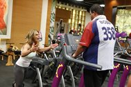"Biggest Loser" trainer Jillian Michaels instructs Bobby Saleem on the treadmill on the show.