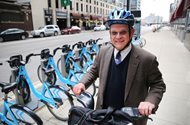 James W. Ozog, a partner at Goldberg, Segalla, uses the Divvy bike-share system to cut transit time between his office and state and federal courts. 