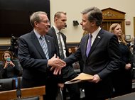 FBI Director Christopher Wray (right) and House Judiciary Committee Chairman Bob Goodlatte, R-Va., shake hands before the start of a House Judiciary hearing on Capitol Hill this morning on oversight of the Federal Bureau of Investigation. 