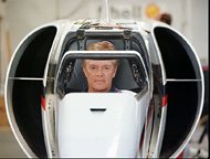 Craig Breedlove sits in the cockpit of a rocket-powered car at his Spirit of America headquarters in Rio Vista, Calif., Aug. 27, 1997. He is pursuing a lawsuit against the Museum of Science and Industry, alleging improper care of a jet-powered Spirit of America from the 1960s. Breedlove was the first to surpass 400 mph, 500 mph and 600 mph land speed record, all in different cars he named Spirit of America. 