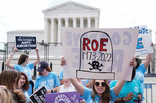 Demonstrators protest about abortion outside the Supreme Court Friday. “We hold that Roe and Casey must be overruled. The Constitution makes no reference to abortion, and no such right is implicitly protected by any constitutional provision,” Justice Samuel Alito wrote in the Dobbs decision.