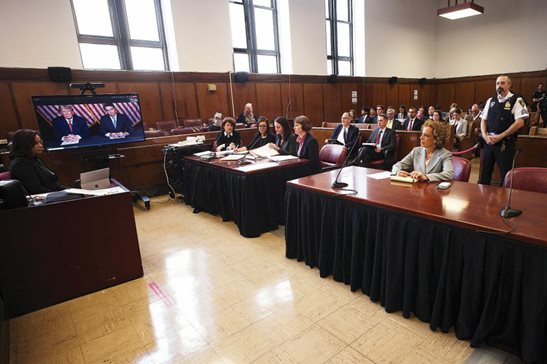 Former president Donald Trump and attorney Todd Blanche appear by video as Trump’s other attorney, Susan Necheles, far right, looks on in person before a hearing in Manhattan criminal court Tuesday. AP Photo/Curtis Means via Pool