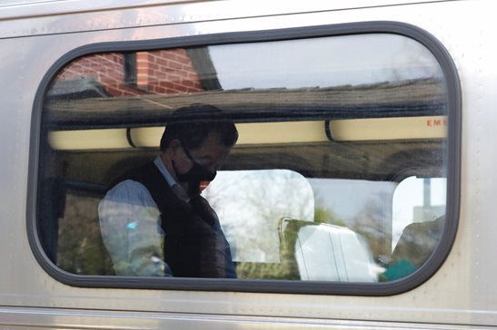 A man wears a mask as he sits in a Metra train at the Glenview Amtrak/Metra Station in Glenview last year. A federal judge ruled a dispute between Metra and several unions must be resolved under binding arbitration, and the unions and their members cannot lawfully strike over the matter.