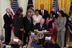 President Joe Biden signs an executive order on police reform in the East Room of the White House on Wednesday, the second anniversary of the death of George Floyd. Floyd’s family and attorneys Antonio Romanucci and Ben Crump were among those attending.