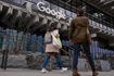 People arrive at the recently opened Google building in New York on Feb. 26. The DOJ and Google made their closing arguments Friday in a high-stakes antitrust trial to a federal judge in Washington who must now decide whether the tech giant’s search engine constitutes an illegal monopoly.
