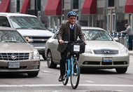 James W. Ozog, a partner at Goldberg, Segalla, uses the Divvy bike-share system to cut transit time between his office and state and federal courts. 