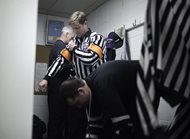 Lawyer and amateur hockey referee Michael B. Barrett, suiting up before a game in Crestwood last month, got involved in the sport when his kids starting playing. “The game is not about the officials,” he said. “It’s about the players.” For more on-ice photos, view this gallery.»