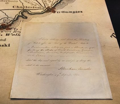 This photo provided by the Abraham Lincoln Presidential Library and Museum shows a document signed by President Lincoln in April 1861 ordering the blockade of southern United States ports after the Confederate attack on Fort Sumter started the Civil War. Abraham Lincoln Presidential Library and Museum via AP