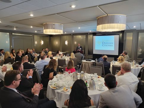 Terry Fox speaks at the Illinois Defense Counsel’s annual luncheon June 24 in Chicago, where he was installed as the group’s 58th president. Photo courtesy of IDC