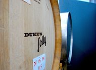 A cask of pinot noir wine aging in Napa, Calif. Duke University is among several colleges that aggressively protects its trademark. It blocked the small California wine company from getting a trademark on its own name, Duke’s Folly, arguing the name implied a false tie to the North Carolina institution and would cause confusion among consumers.